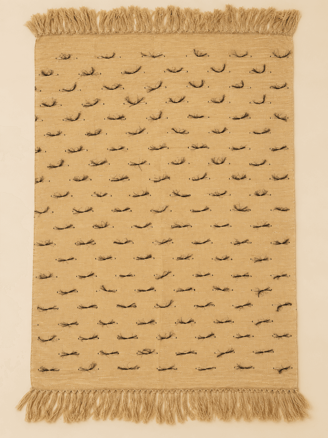 Sand, Black Tuft, laid flat to show the full length