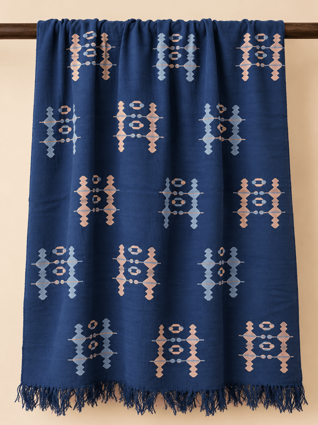 Navy, Ladder & Bead draped over a rail