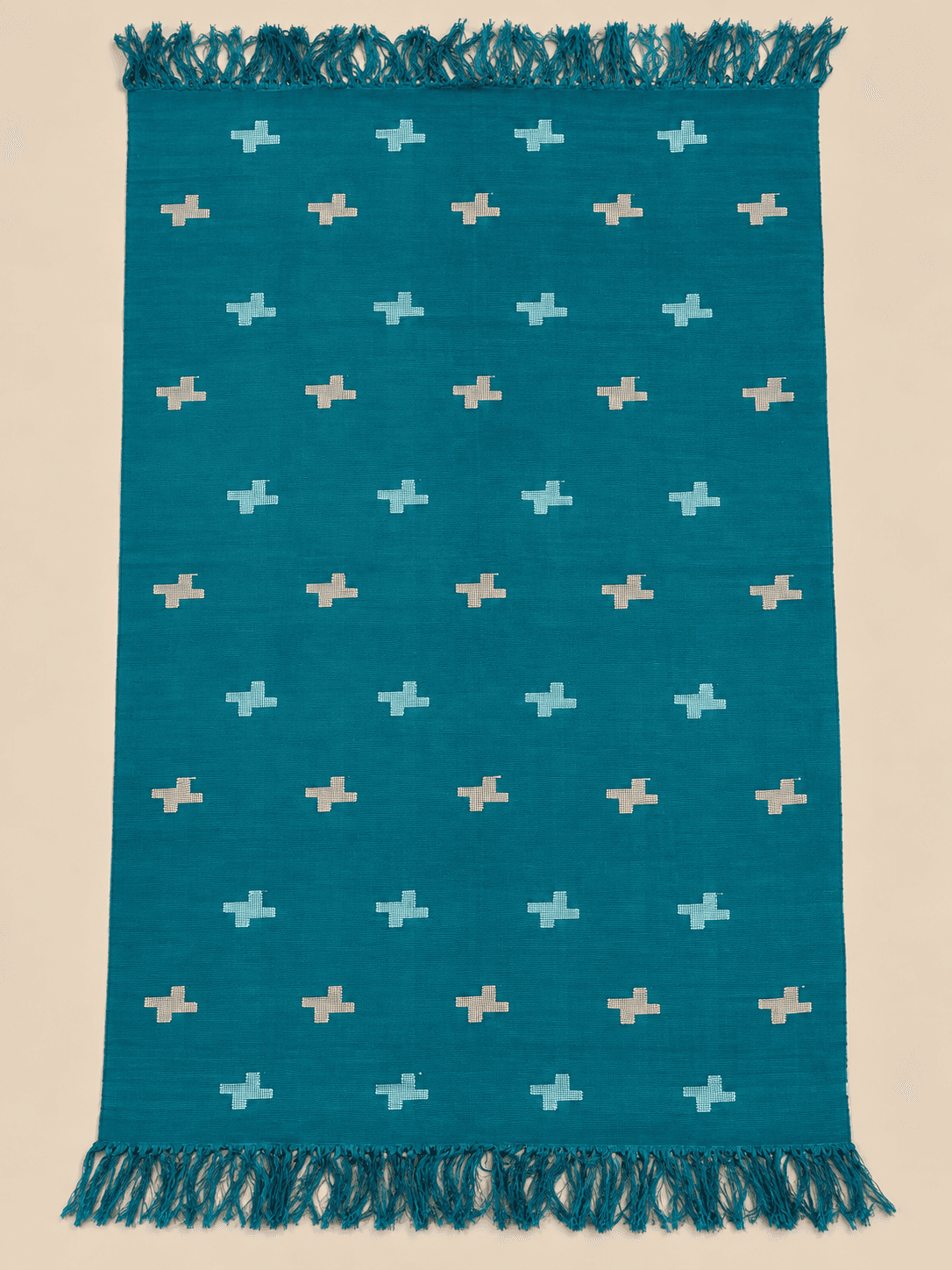 Teal, Stepped Cross, laid flat to show the full length