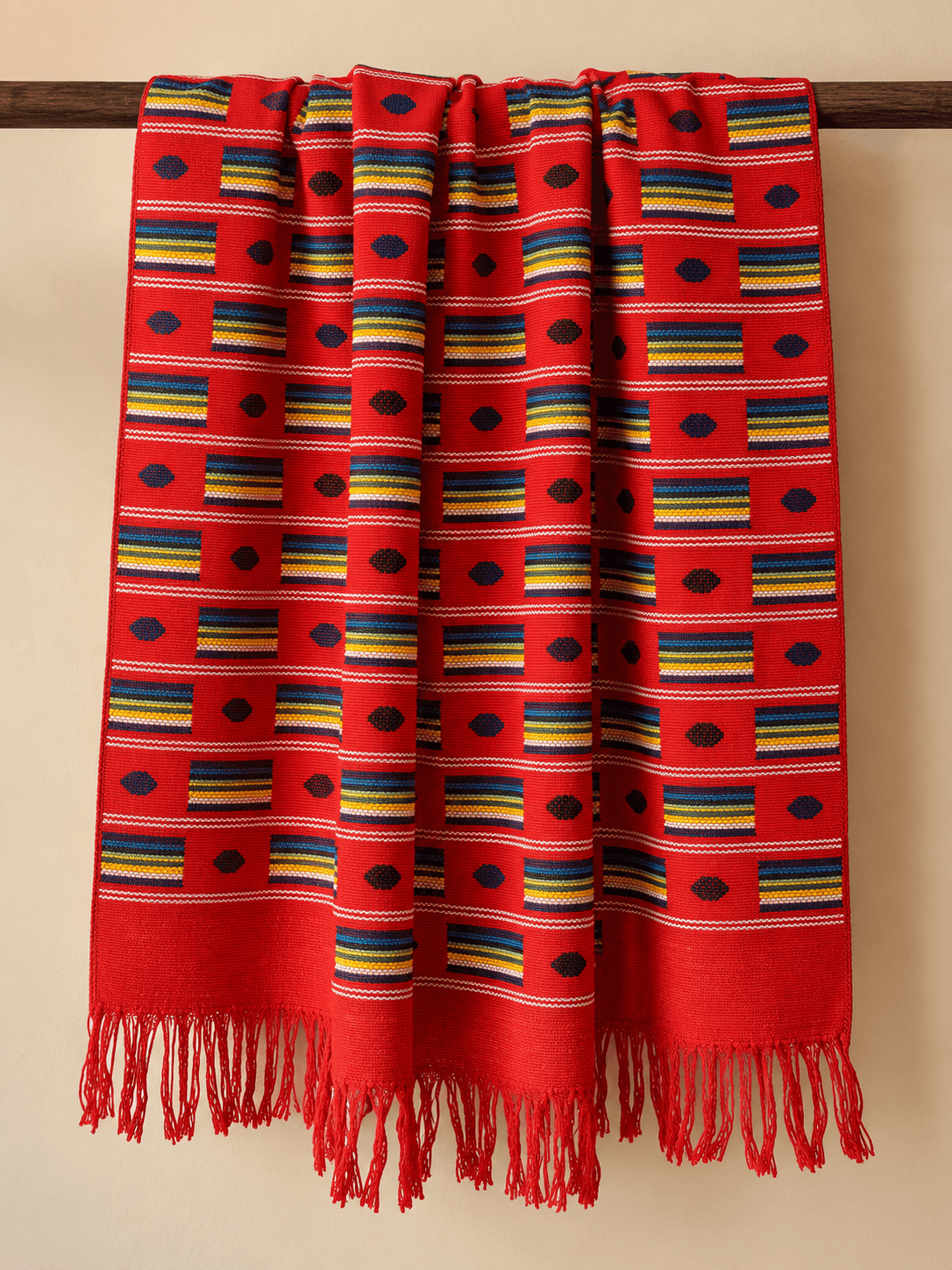 Crimson, Checker & Diamond draped over a rail