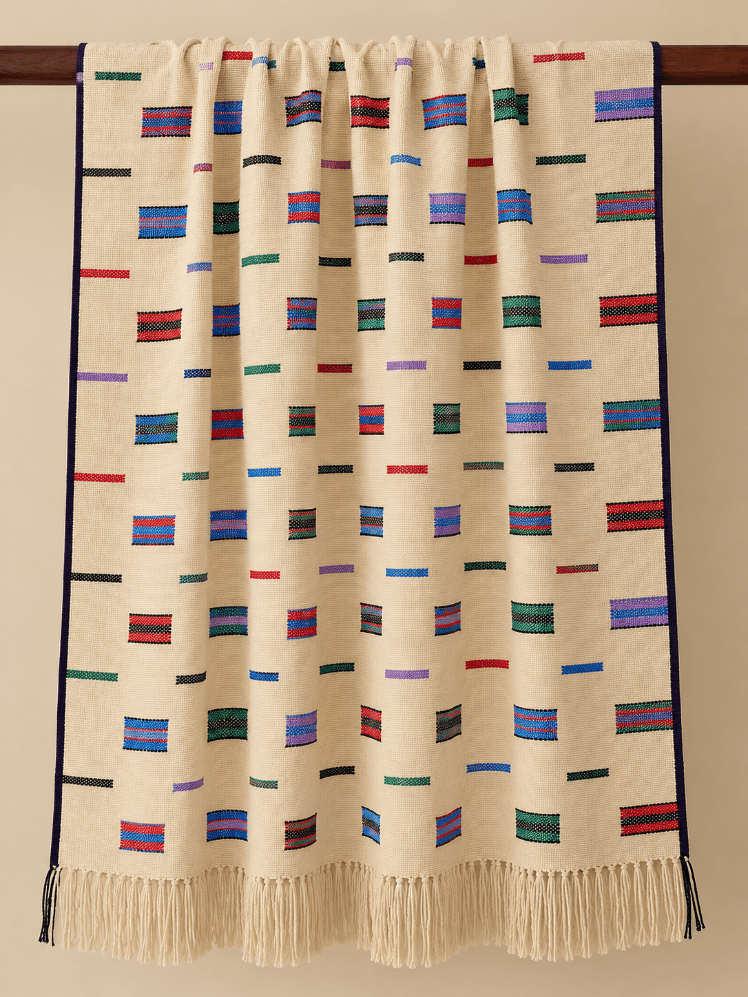 Linen, Dash & Block draped over a rail
